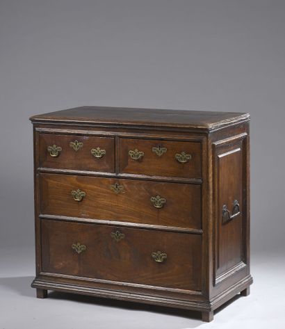 null Straight chest of drawers in molded walnut opening to four drawers on three...
