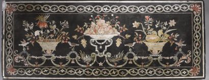 null Large plate in scagliola with black background with reserves centered on a basket...
