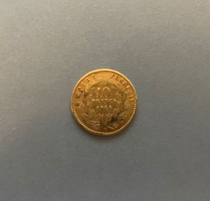 null SECOND EMPIRE
Pièce de dix francs en or Napoléon III tête laurée, année 1864,
Paris.
Poids...