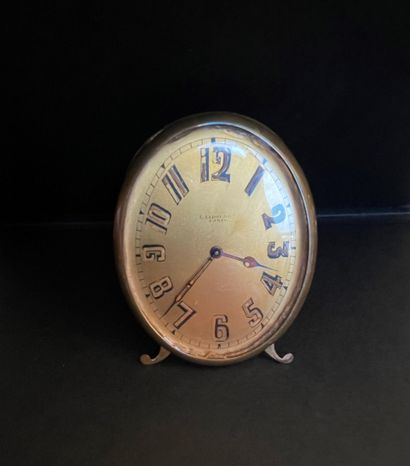 L. LEROY & Co.
Oval travel clock in brass....