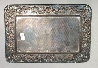 null Rectangular serving tray in embossed metal decorated with flowers and foliage....