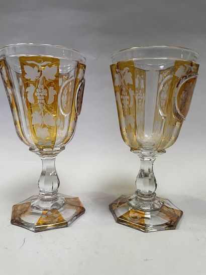 null Two glasses out of yellow doubled glass engraved of vine branches and figured...