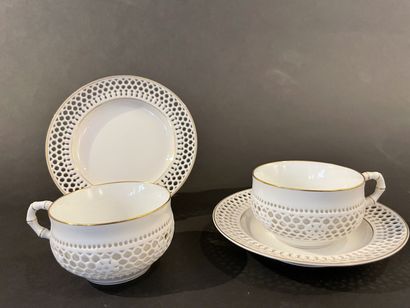 SEVRES

Pair of tea cups and saucers in white...