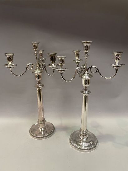 null Pair of silver plated metal torches with four scrolled lights.

Louis XVI style

H...