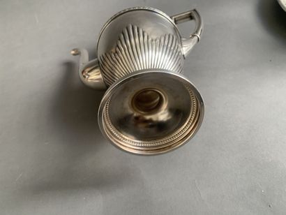 null Tea and coffee set in silver plated metal, the interior gilded with gadroons...