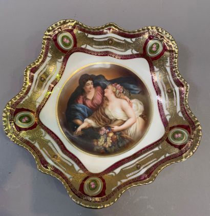 null German porcelain poly-lobed plate decorated with two young women.

End of the...