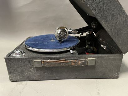null Olympia brand record player in its suitcase