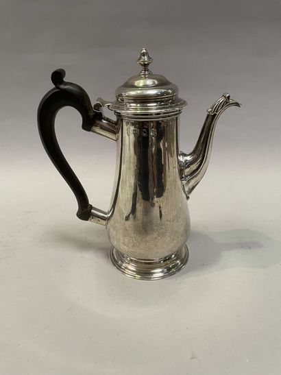 null Coffee pot of truncated cone shape in silver with blackened wood.

English work

H...