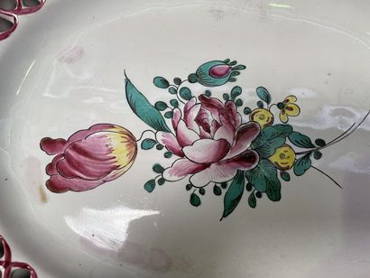 null Oval earthenware dish decorated with roses

and plate with bird decoration

The...