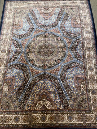null Oriental silk carpet with blue background and rose decoration.

224 x 162 c...