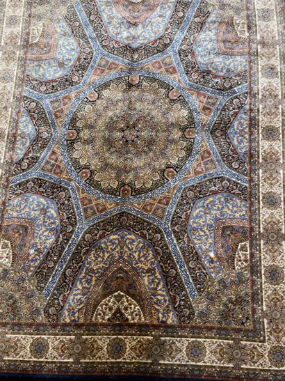 null Oriental silk carpet with blue background and rose decoration.

224 x 162 c...