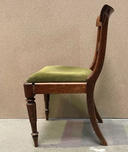 null Suite of three chairs in molded wood with openwork back, the legs joined by...