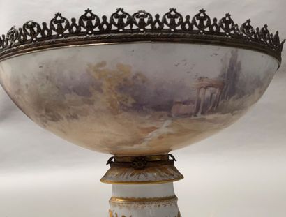 null Large oval porcelain bowl on a pedestal, with polychrome enamelled decoration...