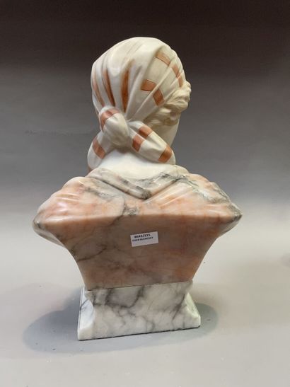 null Bust of a young woman with a scarf in pink veined marble partially painted 

Signed...