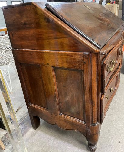 null Scriban desk in molded and carved wood opening to two drawers and a flap.

Provincial...
