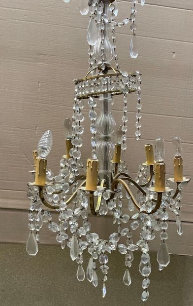 null Two chandeliers :

-one in gilt bronze and tassels, circular shape, with four...