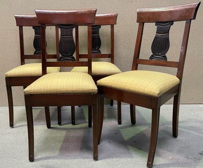 Suite of four mahogany chairs with an openwork...