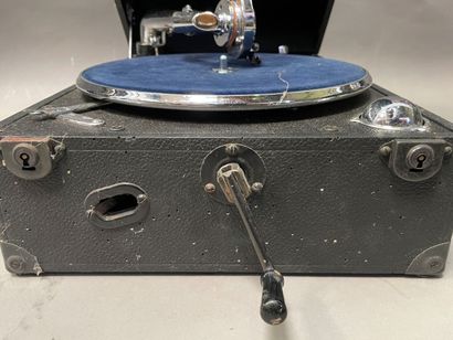 null Olympia brand record player in its suitcase