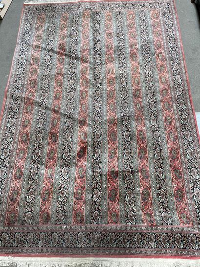 null Wool carpet decorated with bands of botehs.

Iran middle of the XXth century.

286...