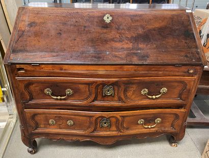 null Scriban desk in molded and carved wood opening to two drawers and a flap.

Provincial...