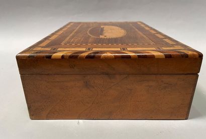 null Marquetry box with steamboat decoration, circa 1900.

Interior divided into...