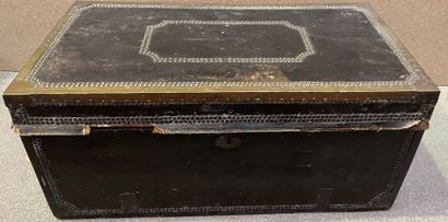 null Travel trunk entirely covered with leather with carved and studded friezes,...