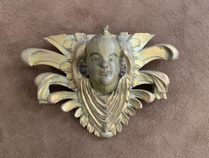null Element in carved wood with a draped and winged head. 

Composed of old elements....