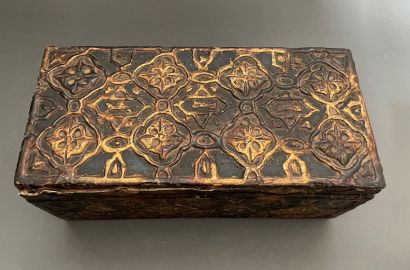 null Set of three wooden boxes: 

-The first one with geometric decoration of rosettes...