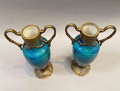 null Pair of blue and green enamelled earthenware vases mounted with gilt bronze.

In...