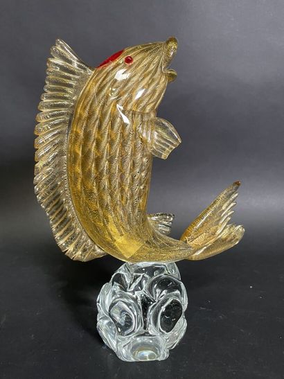 null Fish sculpture in yellow and red glass on round base in colorless glass signed...