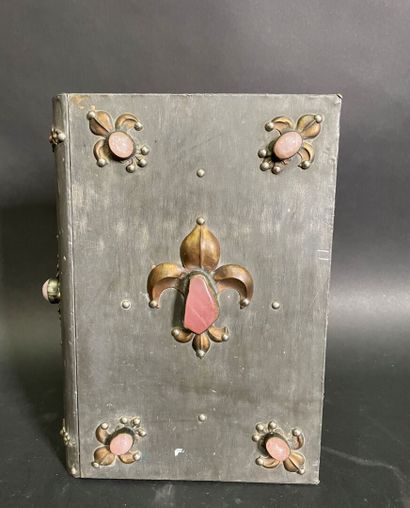 null Metal box simulating a book decorated with fleur-de-lis inlaid with rose quartz...