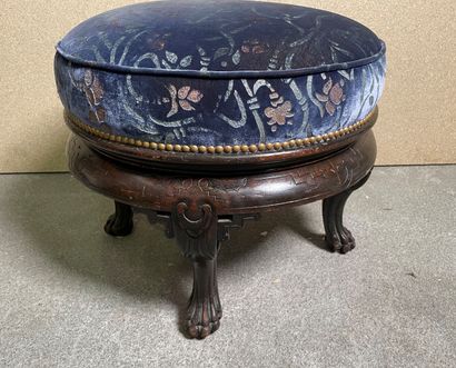 null Stool upholstered in blue velvet decorated with flowers, the legs in the shape...