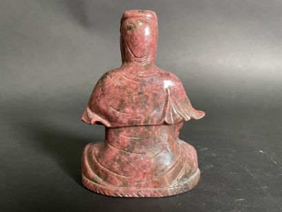 null Seated Buddha in meditation position taking the earth as witness, in pink marble...