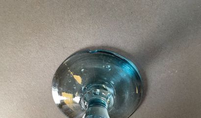 null BIOT

Part of service of glasses with foot out of blue bubbled glass including:...