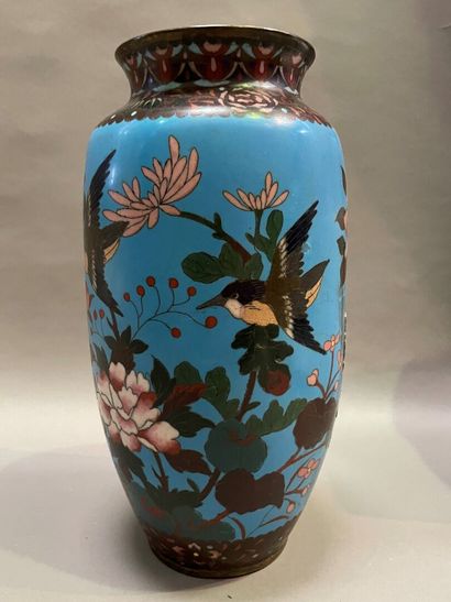 null An ovoid bronze vase with cloisonné enamel decoration of flowers and birds.

H...