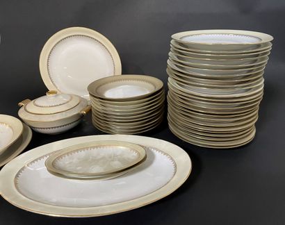 null Limoges porcelain dinner service with pale green marli and gold fillet comprising...