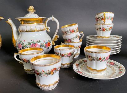 null Porcelain tea and coffee set with flowers and gilding including: two pourers,...