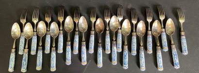 null Twelve cutlery, the handle in porcelain decorated with grotesques and female...