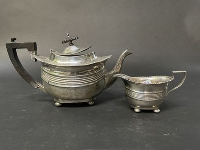 English silver coffee pot and its milk jug,...