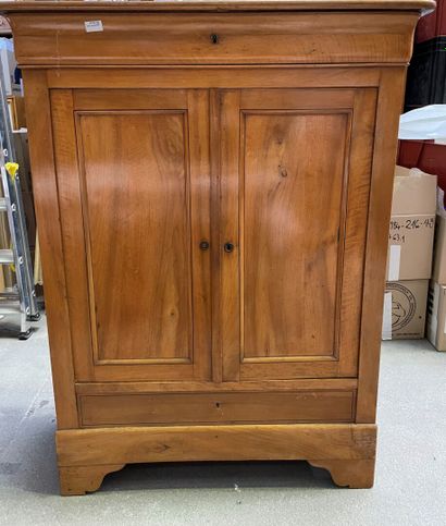 null Small fruitwood cupboard with two doors and two drawers.

Provincial work of...