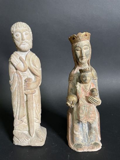 Virgin and Child and knight in carved stone

24...