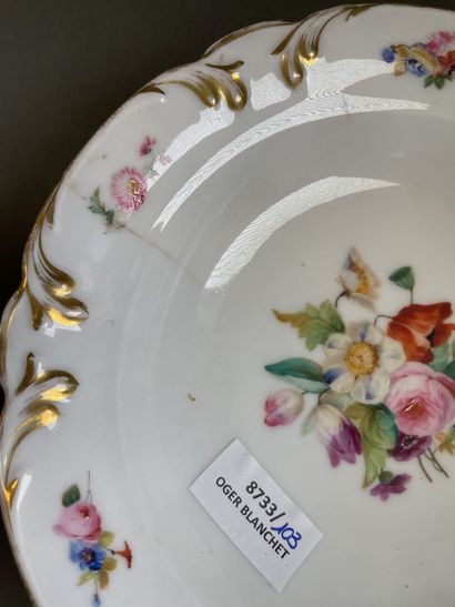 null Porcelain cake service with polychrome decoration of flowers heightened with...