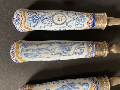null Twelve cutlery, the handle in porcelain decorated with grotesques and female...