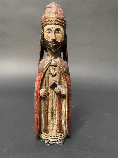 Statue of a bishop in painted and carved...