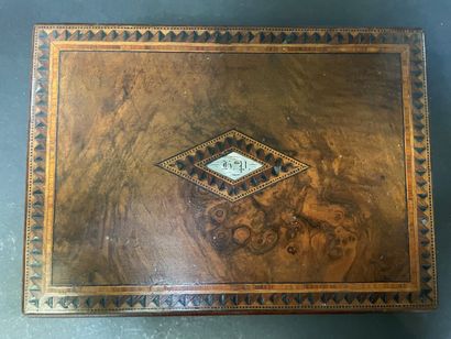 null Walnut veneer case inlaid with a geometric frieze centered on a rhombus and...