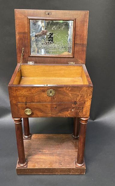 null Mahogany veneered work table with a drawer and a flap top with a mirror background,...