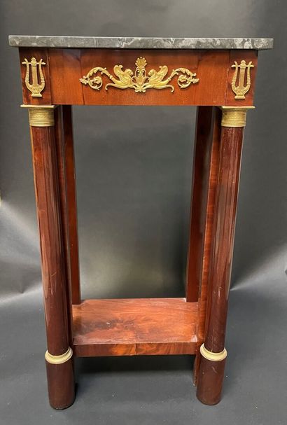 null High mahogany console with two columns in front, ormolu and chased ornaments,...