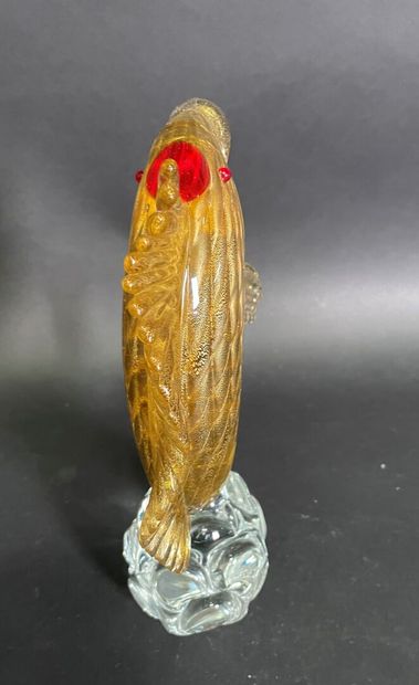 null Fish sculpture in yellow and red glass on round base in colorless glass signed...