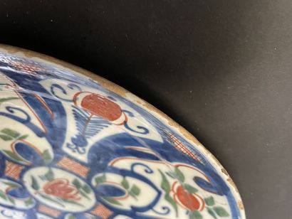 null Assiette en faïence à décor de fleurs

Delft, XVIIIème siècle.

Diam : 23 c...