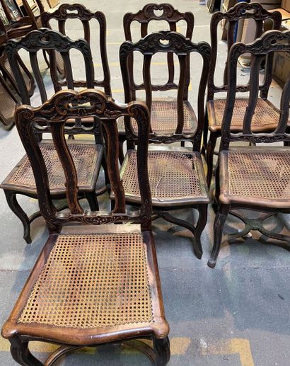 Suite of ten chairs with caned seats in molded...